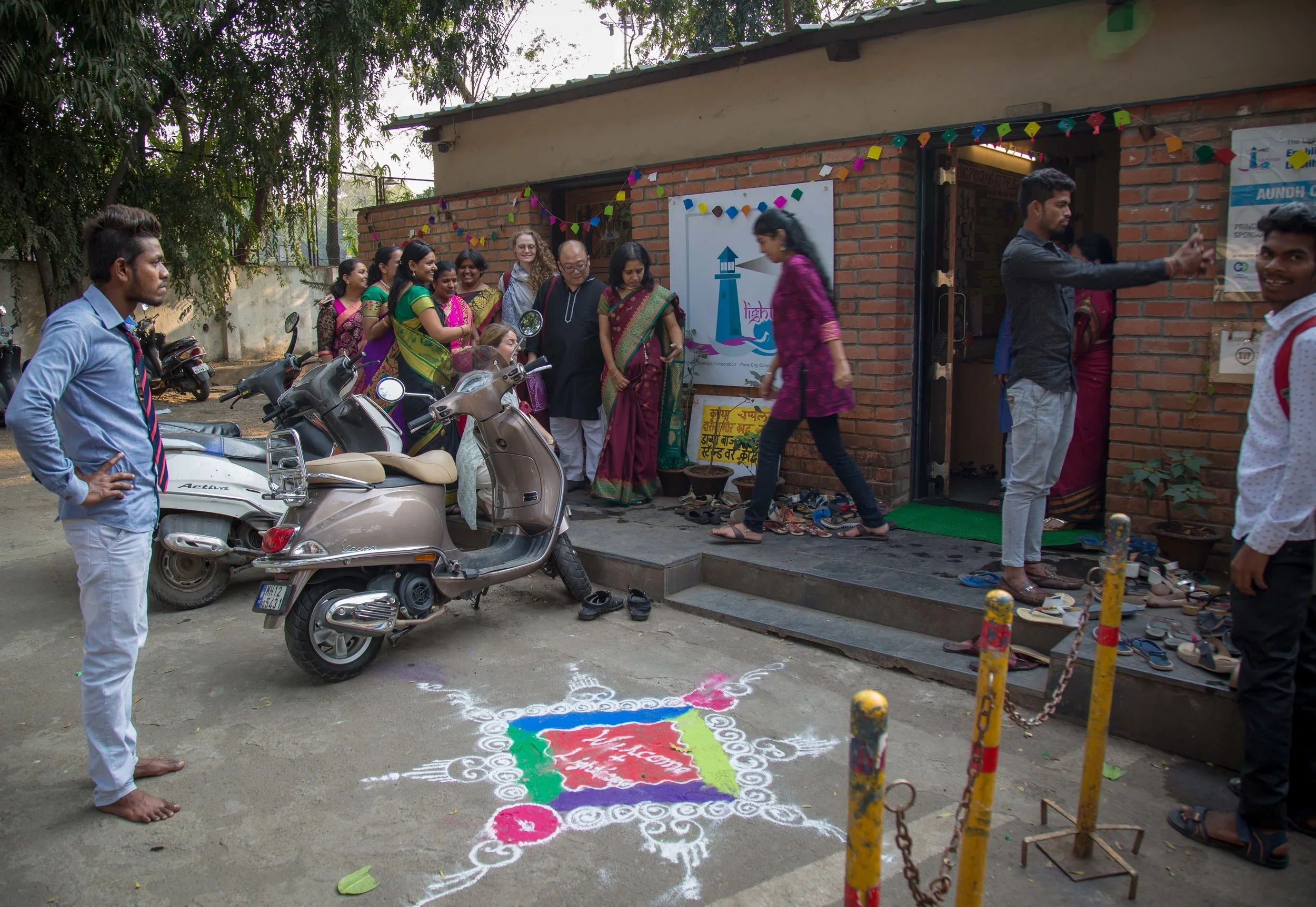 Visitors and students outside the Aundh Lighthouse in Pune